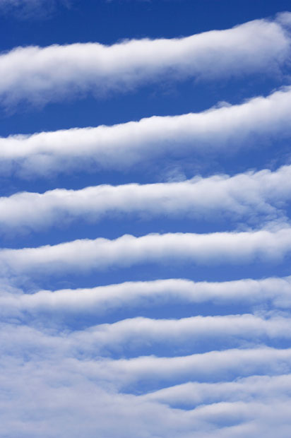 altocumulus undulatus italy parallel bands of cumulus. affected by wind shear